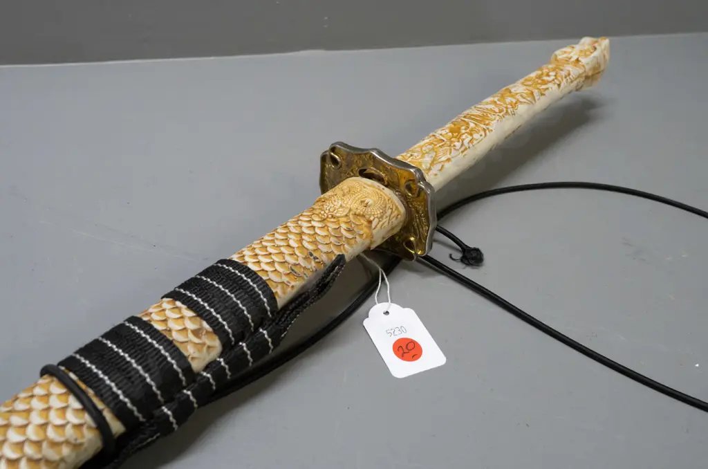 reproduction Japanese sword with composite faux-ivory handle and fish-scale pattern scabbard, brass plated hilt  - some Image 1++