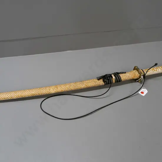 reproduction Japanese sword with composite faux-ivory handle and fish-scale pattern scabbard, brass plated hilt  - some