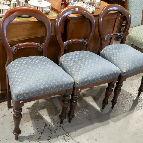 3x mahogany Victorian turned leg balloon back chairs with blue and yellow upholstery