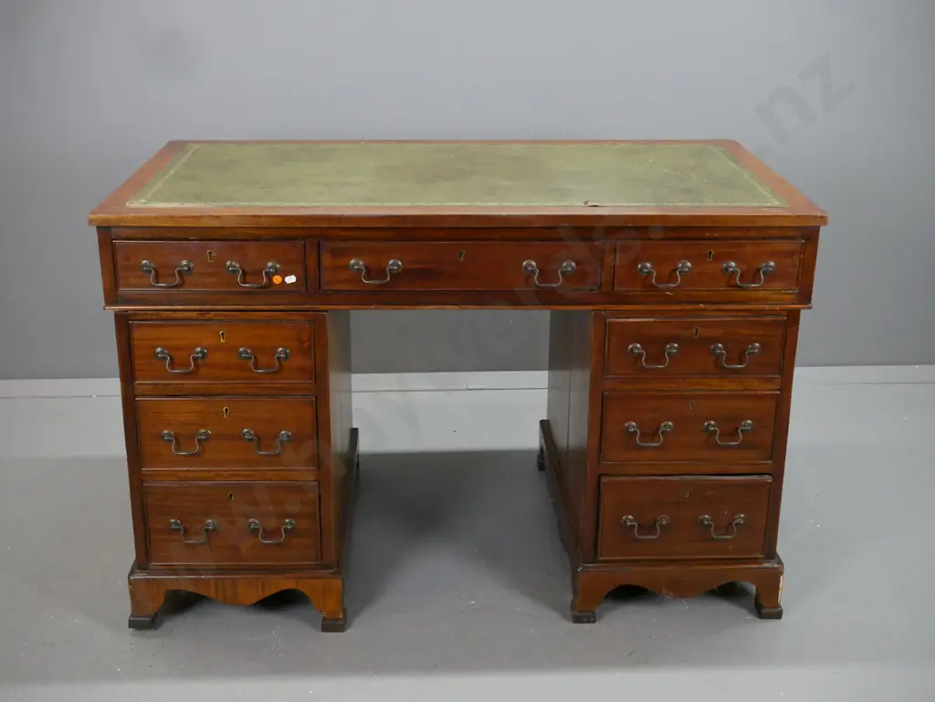 double pedestal oak and mahogany veneer Chippendale style desk with green leather, gold tooled top. Image 1++