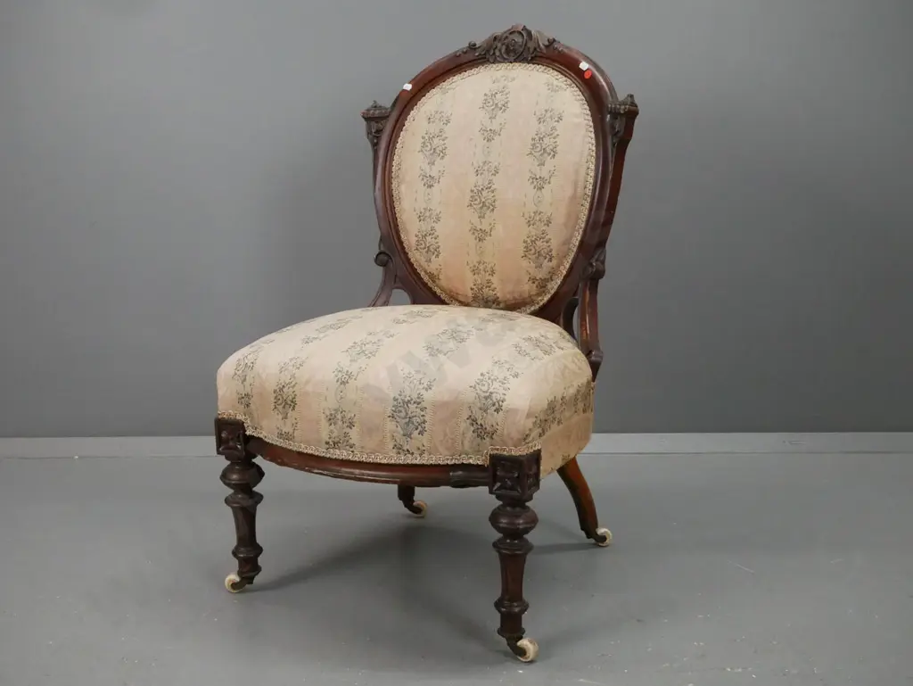 Victorian walnut cameo-back chair with carved back, turned and fluted front legs, white porcelain casters with crowns. Image 1++