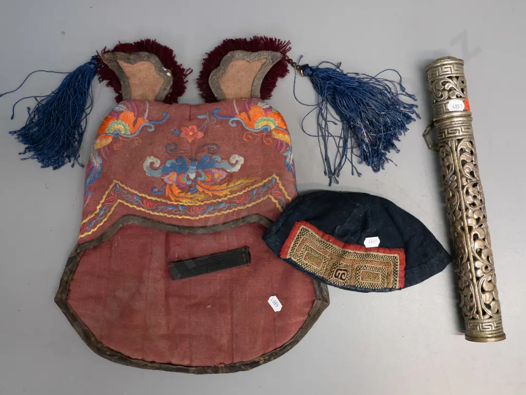 2 Chinese tribal style embroidered hats - small skullcap and larger with tasselled ears - and a pierced silver plated Image 1++