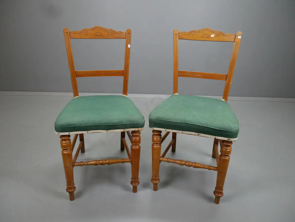 pair of Edwardian green upholstered rimu side chairs, carved back, turned legs and turned stretcher rails Image 1++