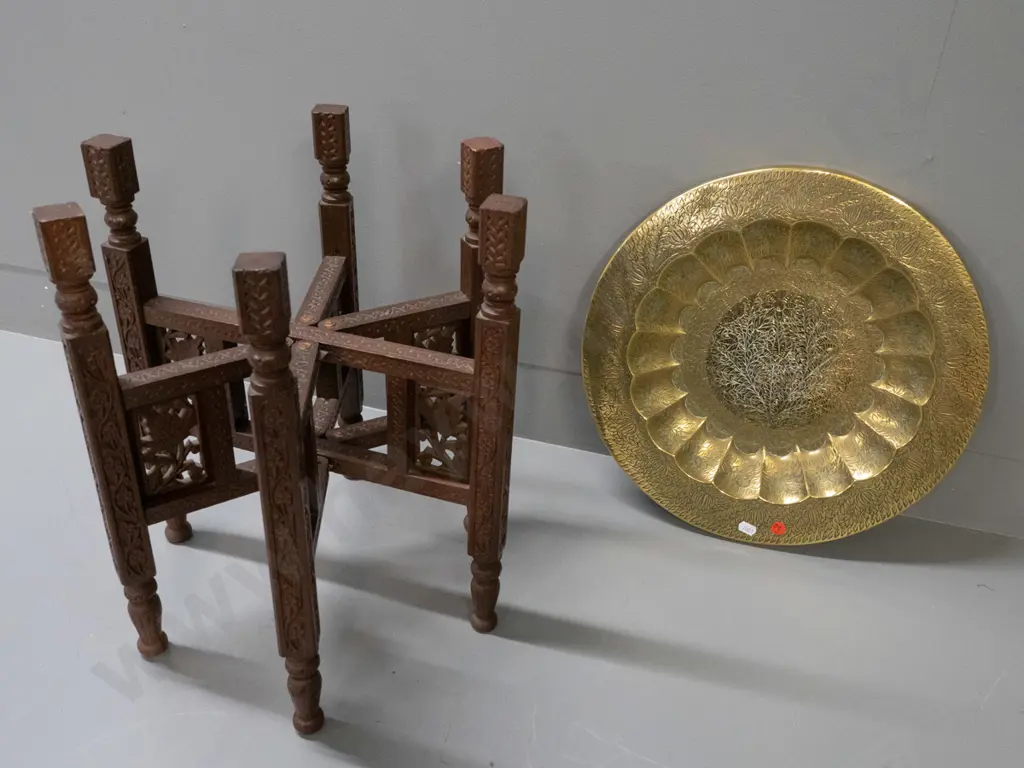 Indian brass tray table with fluted inner rim, floral etched motifs, sitting on folding carved hardwood base H-410 D-380 Image 1++