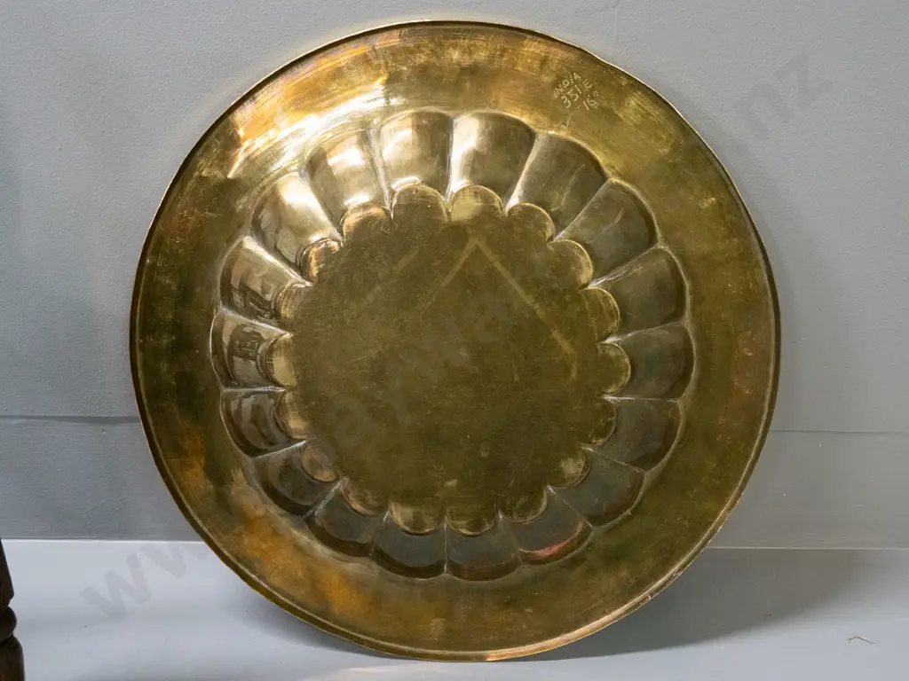 Indian brass tray table with fluted inner rim, floral etched motifs, sitting on folding carved hardwood base H-410 D-380 Image 1++
