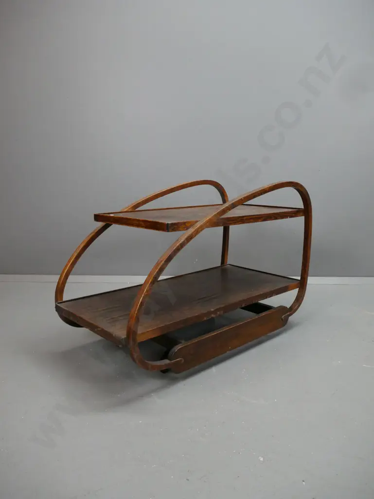 art deco oak sled-shaped bent hoop sided tea trolley on large wheel casters - long bottom shelf has lifting oak laminate Image 1++
