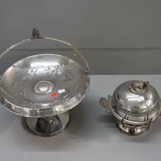 2 vintage plated ware items - comport with handle and a lidded comport sugar dish with tong holder, cow finial to lid.