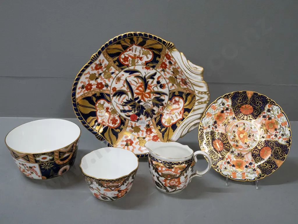 5 Royal Crown Derby items in varying imari patterns - single handled dish, saucer, jug and 2 bowls, plus a few pamphlets Image 1++