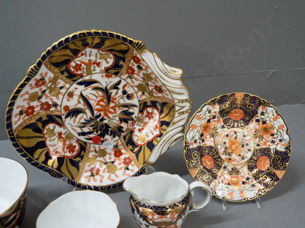 5 Royal Crown Derby items in varying imari patterns - single handled dish, saucer, jug and 2 bowls, plus a few pamphlets Image 1++