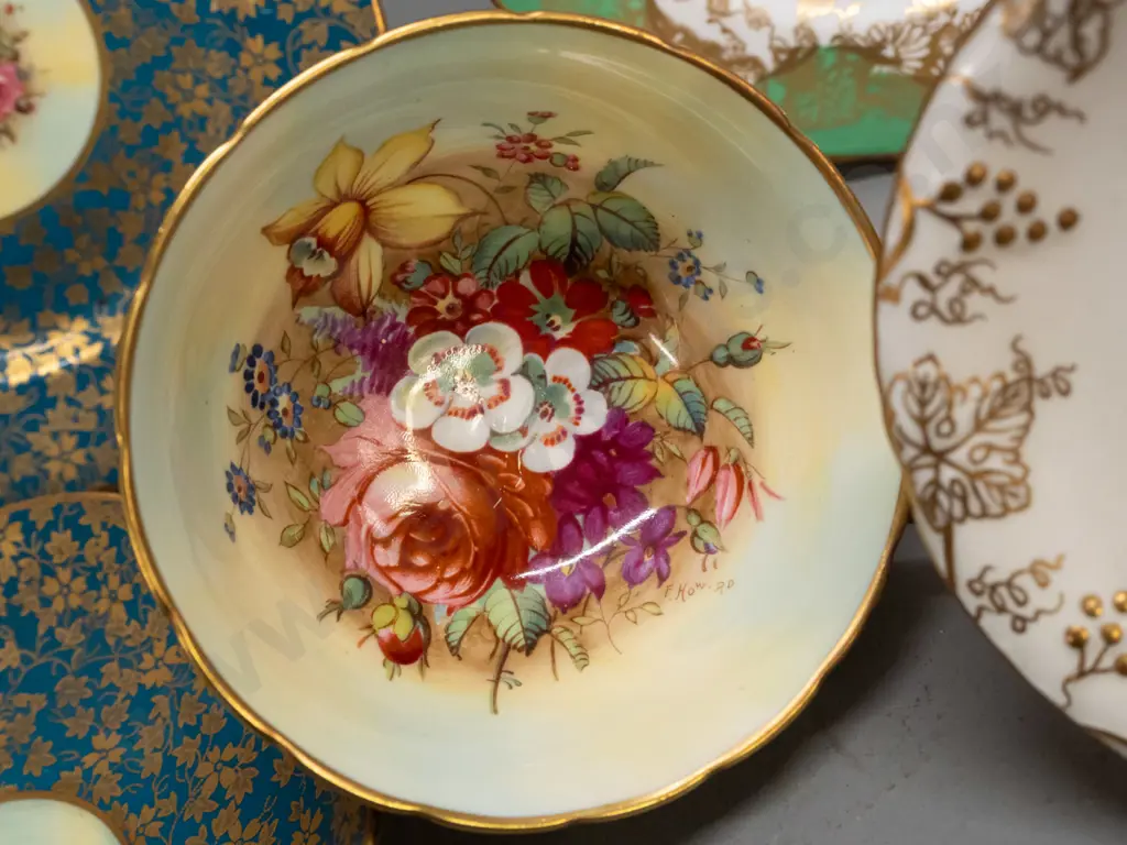 2 vintage Hammersley gilded rim trios, one with floral cup signed F. Howard - and a Crown Derby "Vine" coffee cup Image 1++