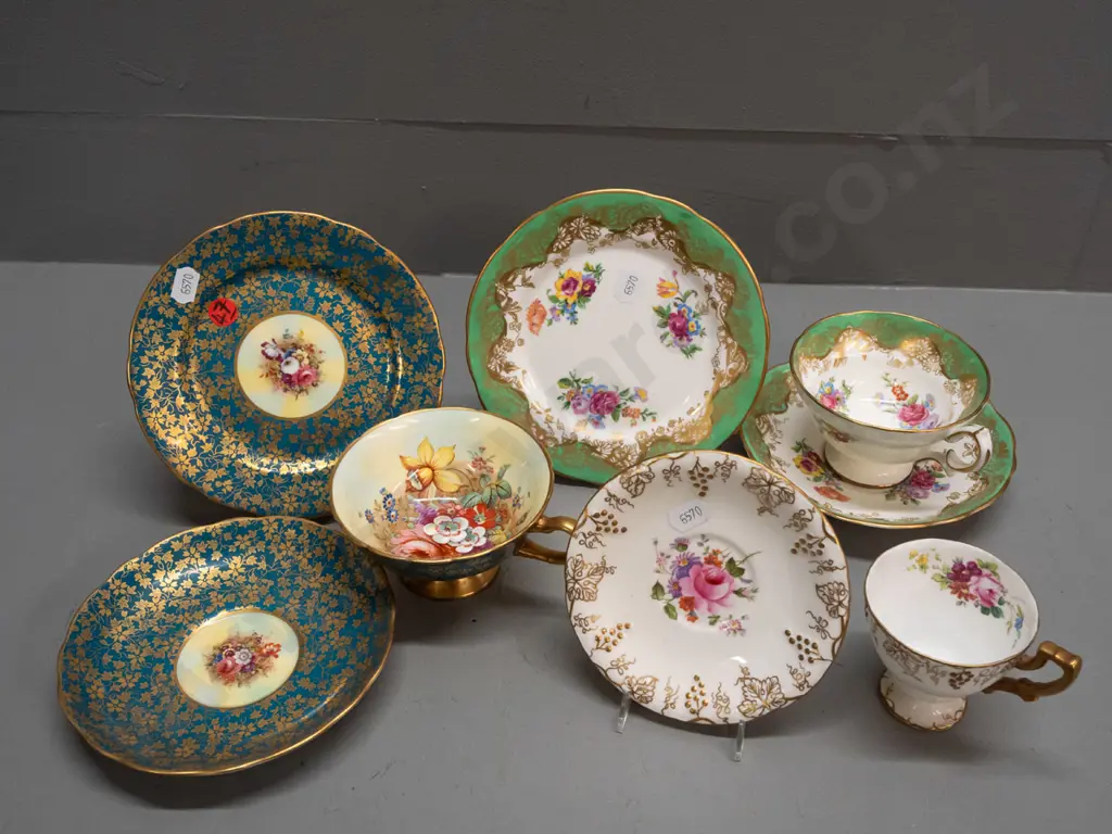 2 vintage Hammersley gilded rim trios, one with floral cup signed F. Howard - and a Crown Derby "Vine" coffee cup Image 1++