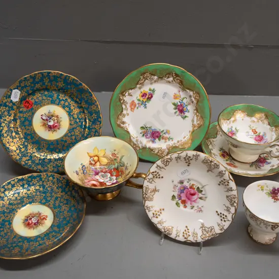 2 vintage Hammersley gilded rim trios, one with floral cup signed F. Howard - and a Crown Derby "Vine" coffee cup