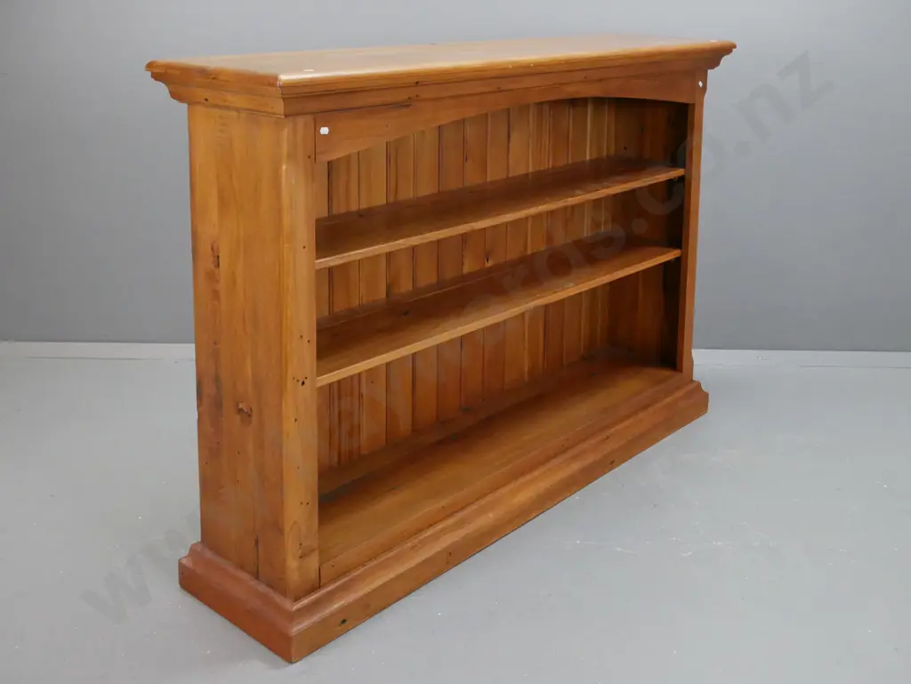 recycled rimu and matai bookcase with 2 adjustable shelves on shaped plinth base, T&G back - some staining H-1030 W-1490 Image 1++