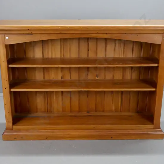 recycled rimu and matai bookcase with 2 adjustable shelves on shaped plinth base, T&G back - some staining H-1030 W-1490