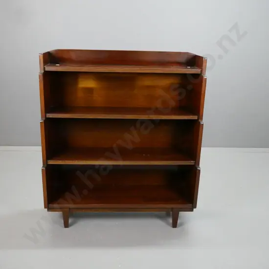 vintage dark stained mahogany stepped front bookcase on square tapered legs - some chipping / wear to surface H-1080