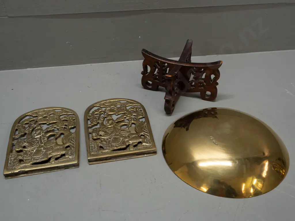 Chinese brass items - pair of pierced book-ends H-145 and a bowl with incised decoration D-180 on wooden base Image 1++