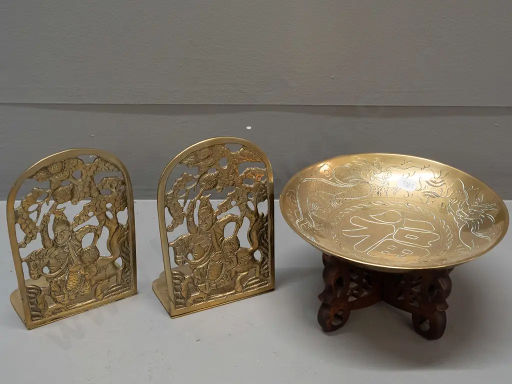 Chinese brass items - pair of pierced book-ends H-145 and a bowl with incised decoration D-180 on wooden base Image 1++