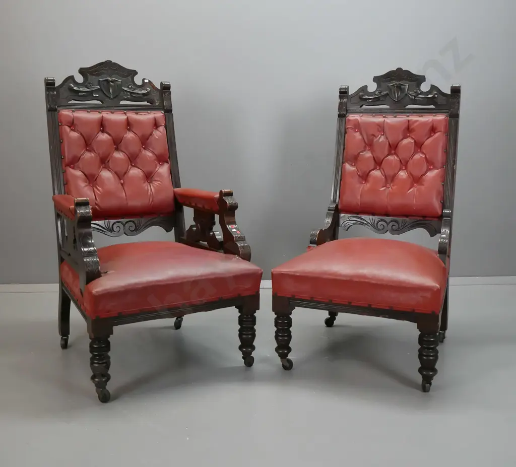 restorer's New Zealand colonial kauri and rimu lady's and gent's chairs with deep button vinyl upholstery, carved crest Image 1++