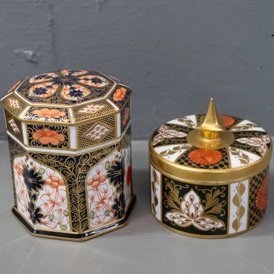 2 Imari pattern lidded canisters - Royal Crown Derby faceted sided, and an Abbeydale chrysanthemum pattern with gilded
