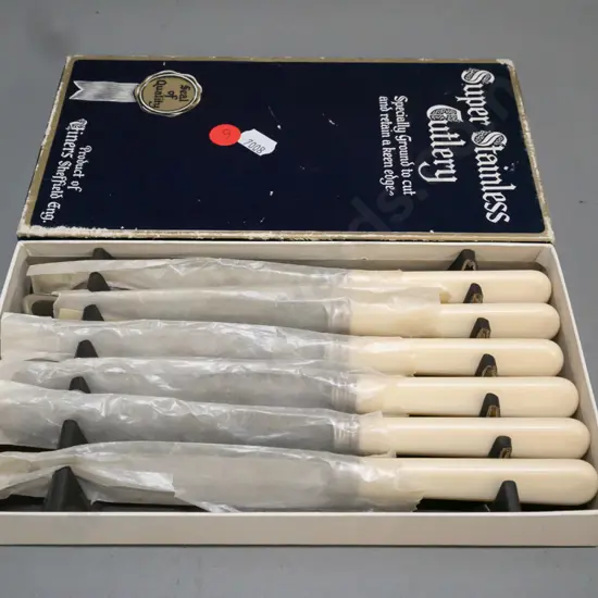 As new set of Super Viners Sheffield faux-bone-handled Super Stainless knives in original box