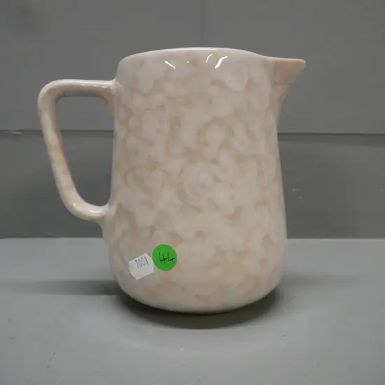 Temuka ware jug with mottled whitewash trickle glaze H-150 W-150