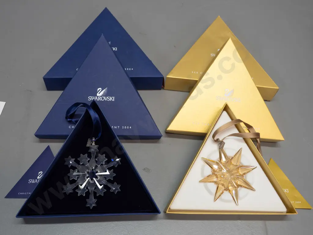 2 Swarovski crystal Christmas snowflake ornaments in original boxes - 2004 and an amber/gold colour 2009 Image 1++