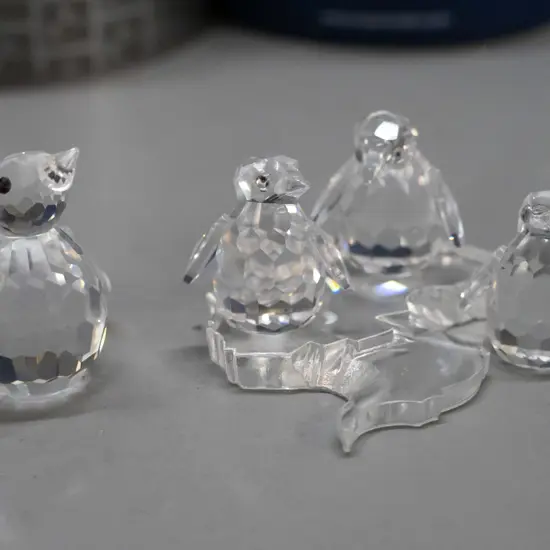 Swarovski crystal penguins in original boxes - group of 3 with plastic ice floe and a single H-25