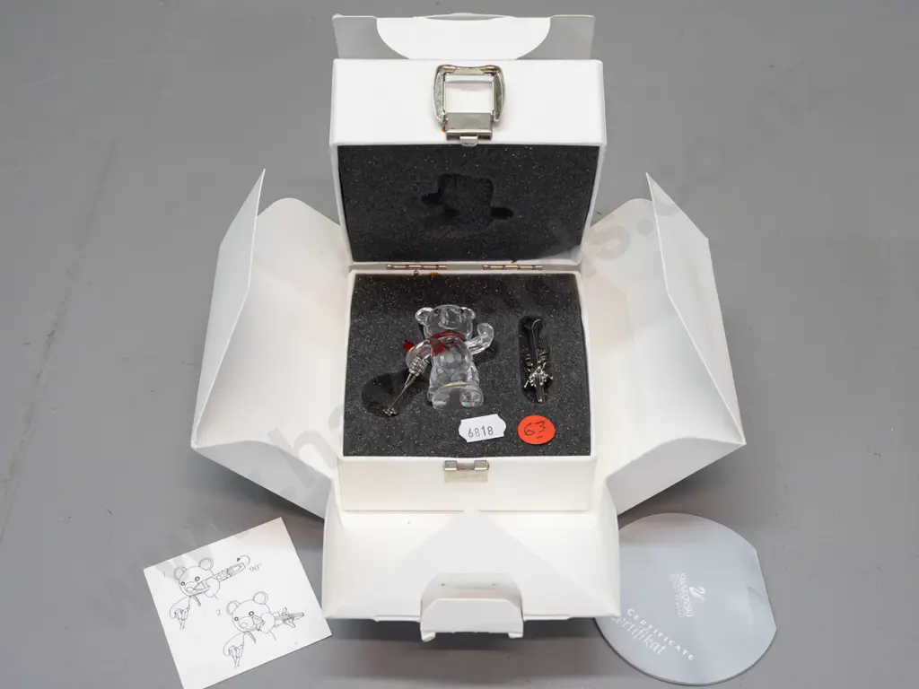 Swarovski crystal cased Teddy bear with skis, ski poles, and striped scarf, in original box. H-45 Image 1++