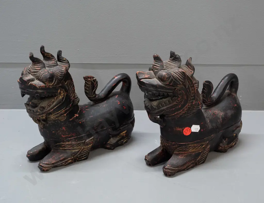 2 Chinese carved wood figural temple lion vessels with lift off tops, some chips and wear to paint over laquer finish Image 1++