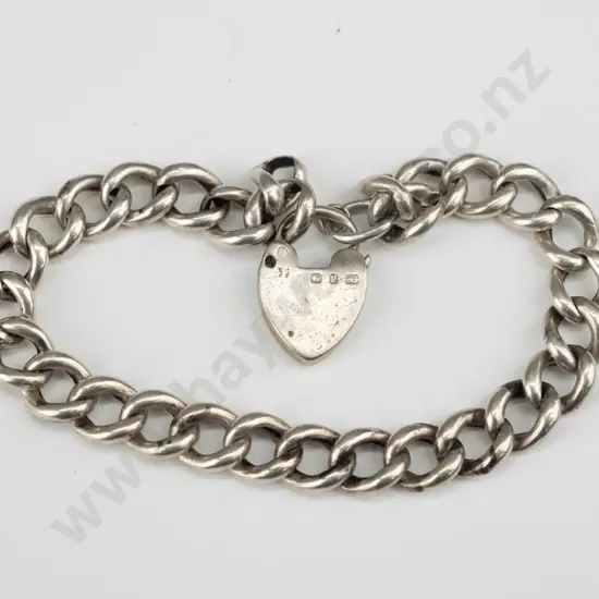 silver bracelet with heart clasp stamped