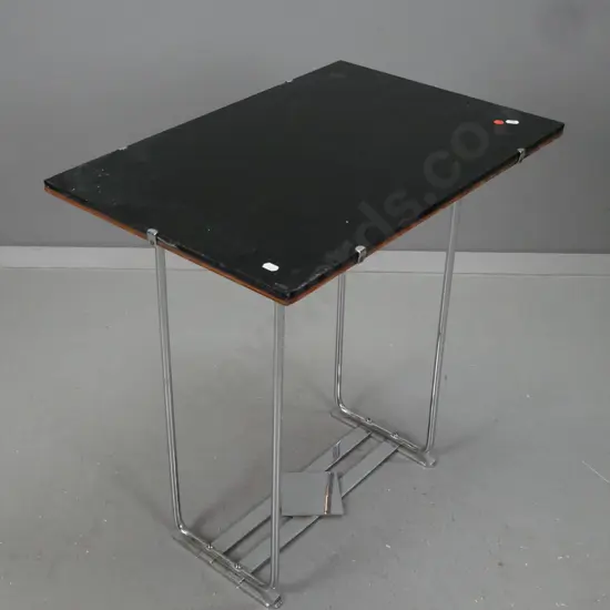 deco style chrome-based side table with black glass over plywood top has scratching and chipping around edge - a bit