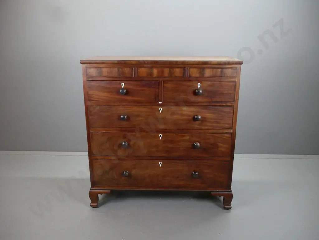 late Georgian mahogany chest of drawers - 3 hidden frieze drawers above 5 main drawers with turned wooden knobs and bone Image 1++