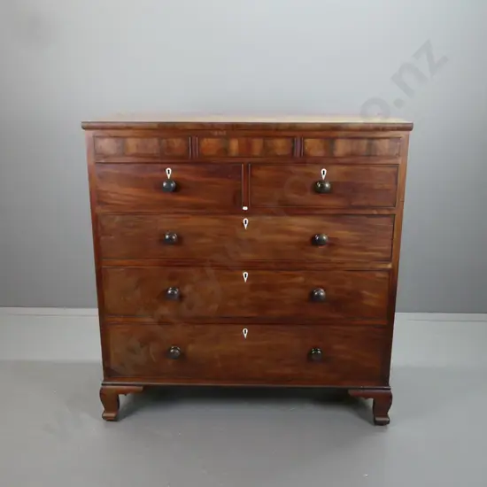 late Georgian mahogany chest of drawers - 3 hidden frieze drawers above 5 main drawers with turned wooden knobs and bone