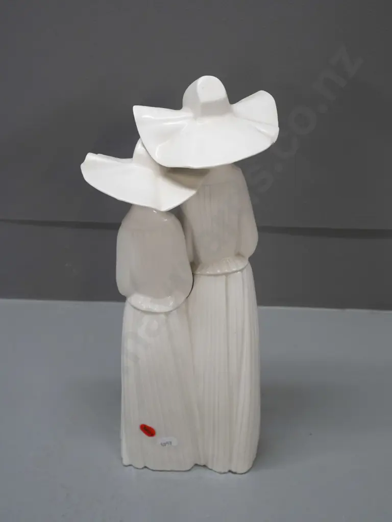 Lladro figure of 2 nuns, some adhesive residue on base H-330 Image 1++