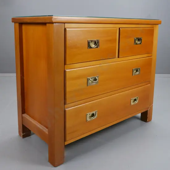 New Zealand made colonial style chest of 4 drawers with brass inset campaign style handles,