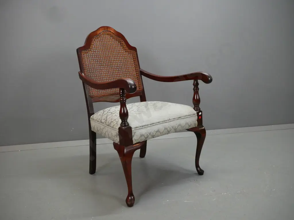 retro mahogany open-armed chair with cane insert in shaped back, turned front supports, light green upholstered seat - a Image 1++
