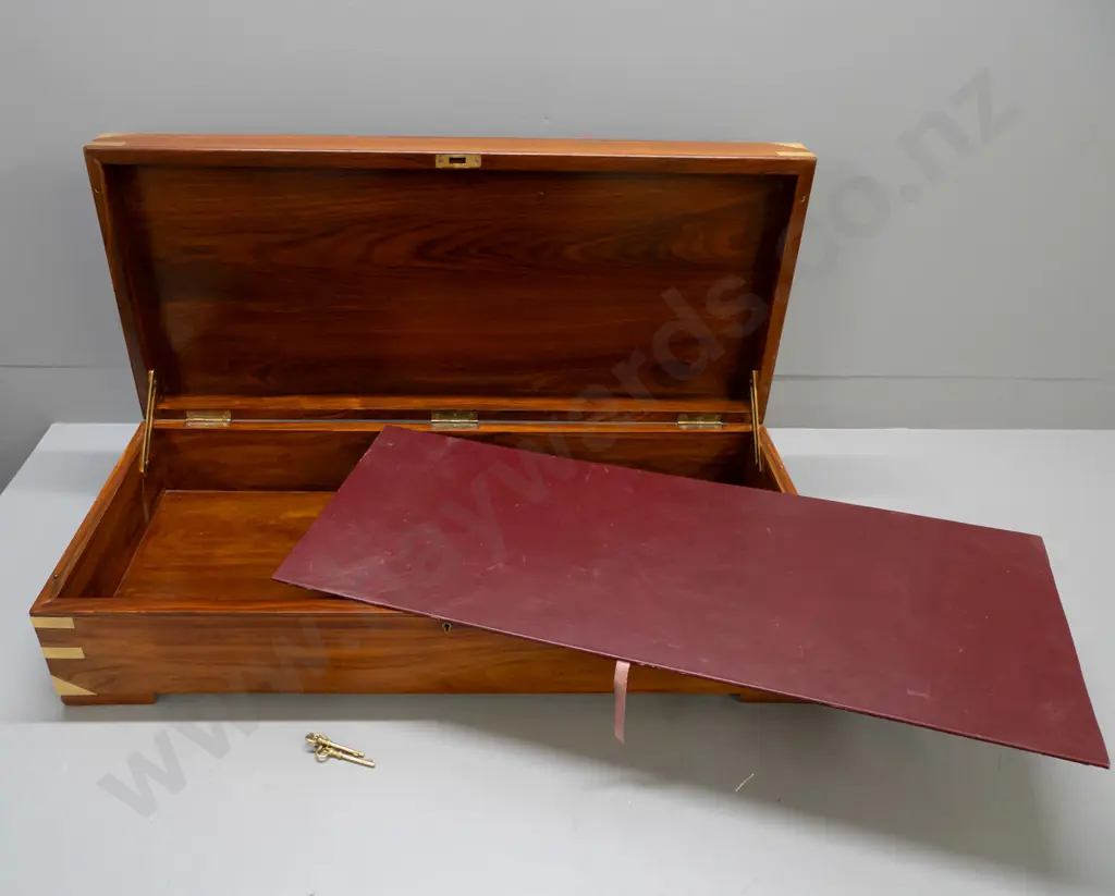 large brass bound rosewood chest with brass bound corners, brass wire inlay motif on top, on block feet, working lock w/ Image 1++