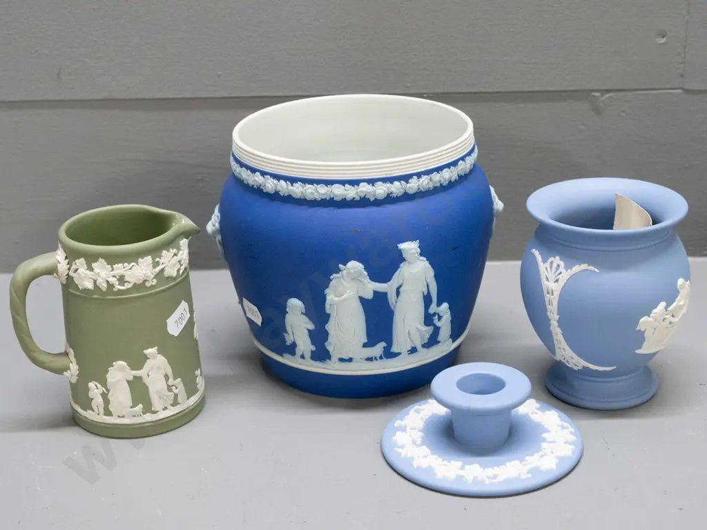 4 pieces of Wedgwood Jasperware - dark blue jardiniere H-130 D-130, light blue vase and candlestick, and a green jug. Image 1++