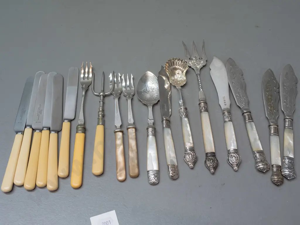 assorted vintage silver plated mother of pearl and bone handled cutlery, some with engraved blades, various patterns Image 1++