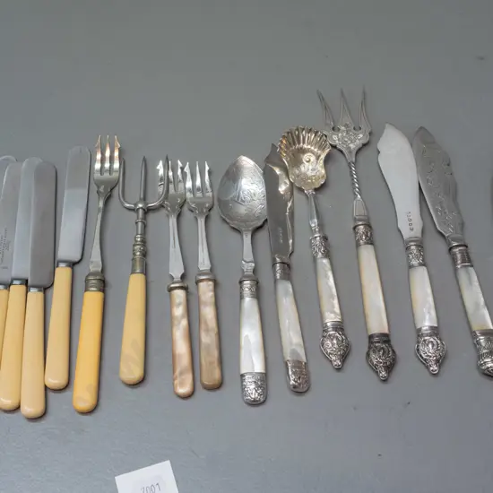assorted vintage silver plated mother of pearl and bone handled cutlery, some with engraved blades, various patterns