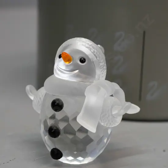 Swarovski crystal snowman figure with black and orange decoration H-60, with original box