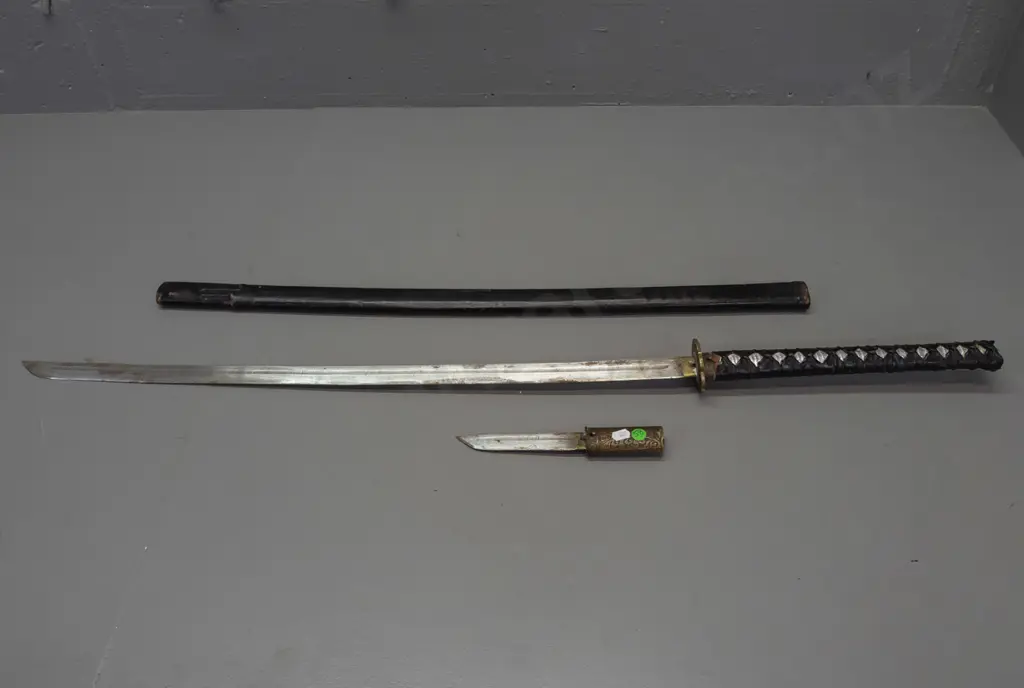 vintage Japanese sword in shark or ray skin covered scabbard, with small knife inset in handle, engraved brass handle Image 1++