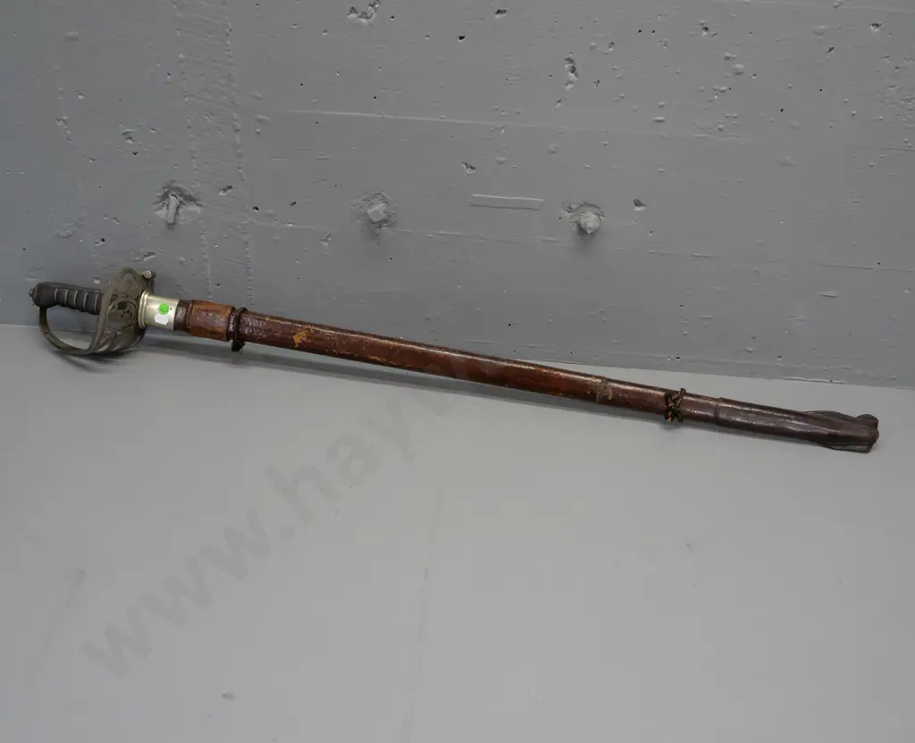 Manton of Calcutta officer's dress sword with etched decoration to blade, pierced hilt with crown, horn and ribbon Image 1++