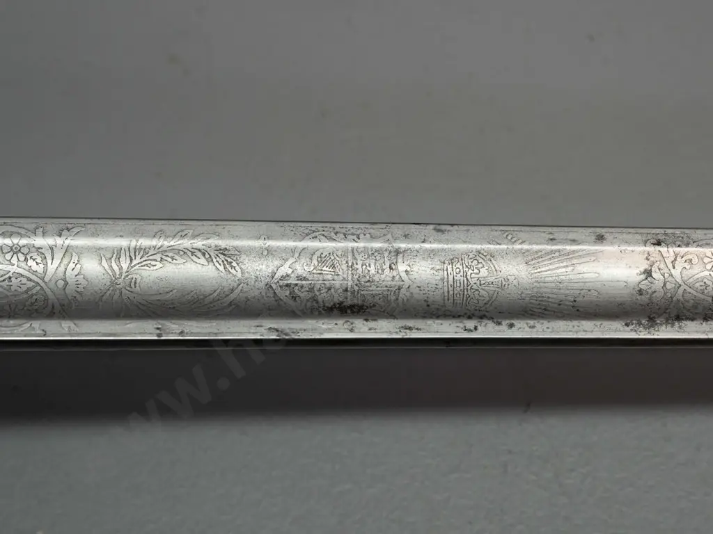 Manton of Calcutta officer's dress sword with etched decoration to blade, pierced hilt with crown, horn and ribbon Image 1++