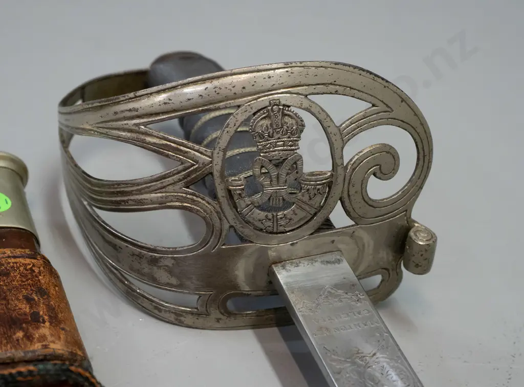 Manton of Calcutta officer's dress sword with etched decoration to blade, pierced hilt with crown, horn and ribbon Image 1++
