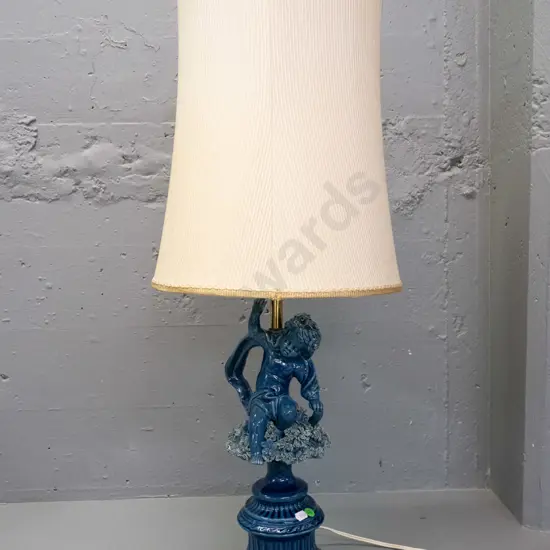 antique Italian-made blue-glazed ceramic table lamp w/ cherub & raised floral details, waisted fluted gold-rimmed cloth