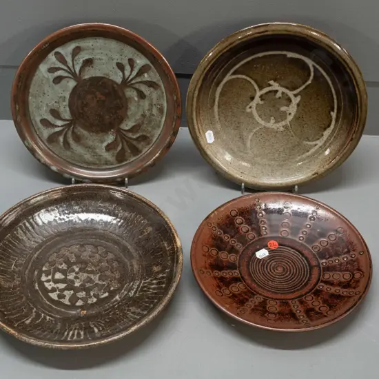4 New Zealand studio pottery plates - various unknown maker's marks, largest is D-260