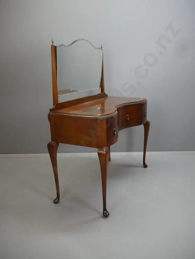 art deco style dressing table with shaped bevelled edge mirror, tapered square supports w/ brass urn finials, serpentine Image 1++