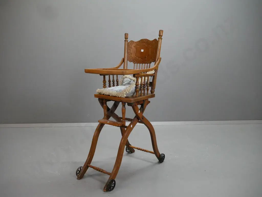 vintage oak and elm collapsible child's high chair with press-carved back, lift up tray, foot rest, woven Image 1++