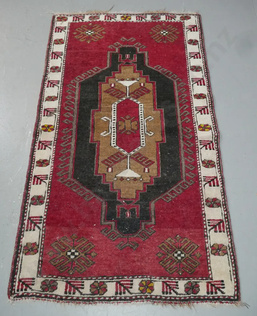 tribal style hand knotted wool floor rug with geometric red black brown and ivory pattern - some wear and staining, red Image 1++